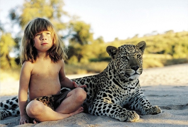 These Pictures Of The Real-Life Mowgli Who Grew Up Riding Elephants In Africa Are Breathtaking 