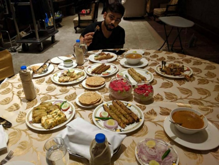 This Picture Of Virat Kohli Stuffing His Face With Burgers Is Every One Of Us As A Kid