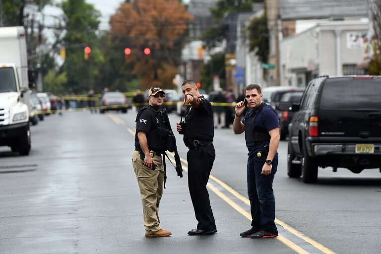 New York Bomb Suspect Held, Charged With Attempted Murder After Shootout