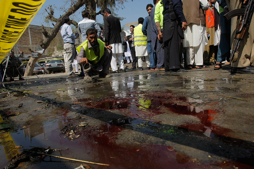 A suicide bomber on foot struck a government vehicle in Kabul on Wednesday