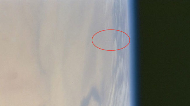 This NASA Photograph Allegedly Shows A Formation Of UFOs Orbiting Earth